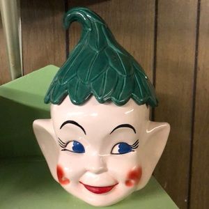 A pixie? An elf? A sprite? Jolly green giants offspring?